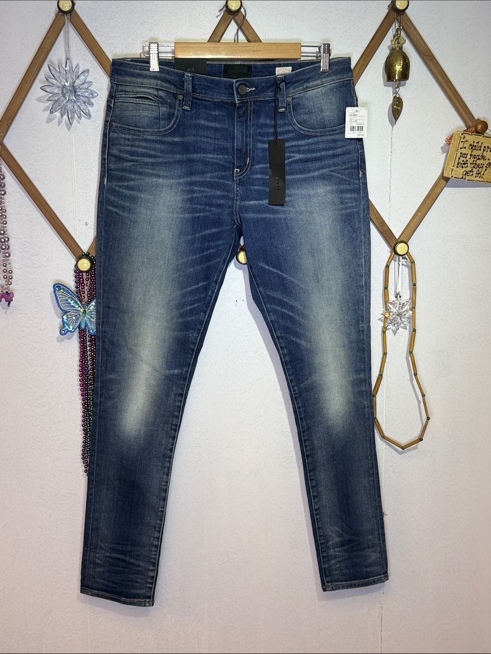 Buckle Skinny Jeans in Medium Blue Wash